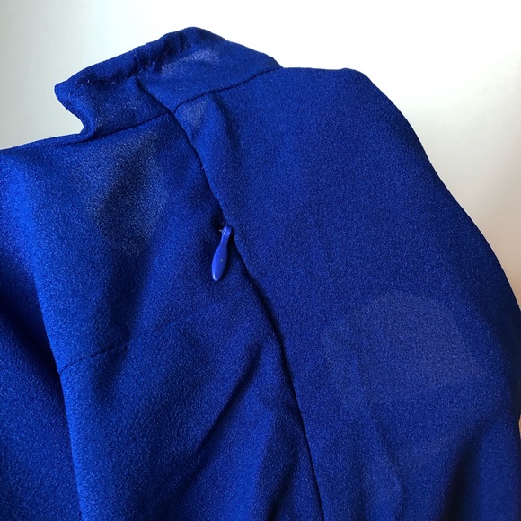 Peplum Shirt with Cut-Out Back - Picture 11 of 12